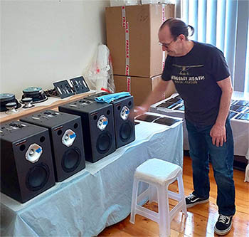 Wayne Jones demonstrating recording studio monitors